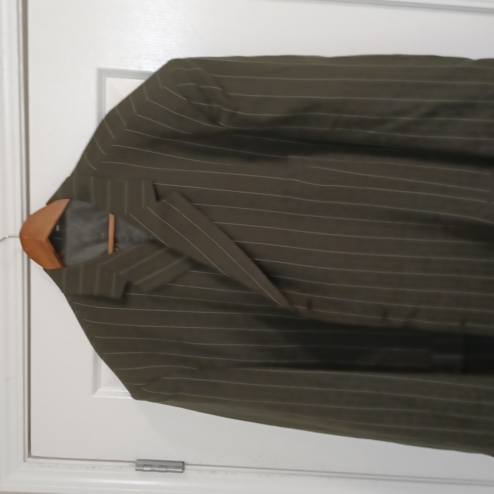 Three piece gray pinstripe suit.